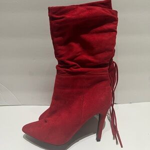 Red suede women boot heels.